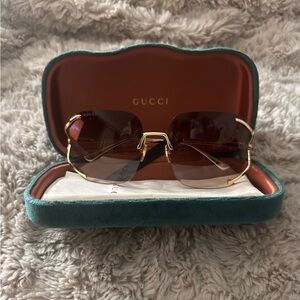 Gucci Women's Sunglasses with Gold Frame and Brown Lenses